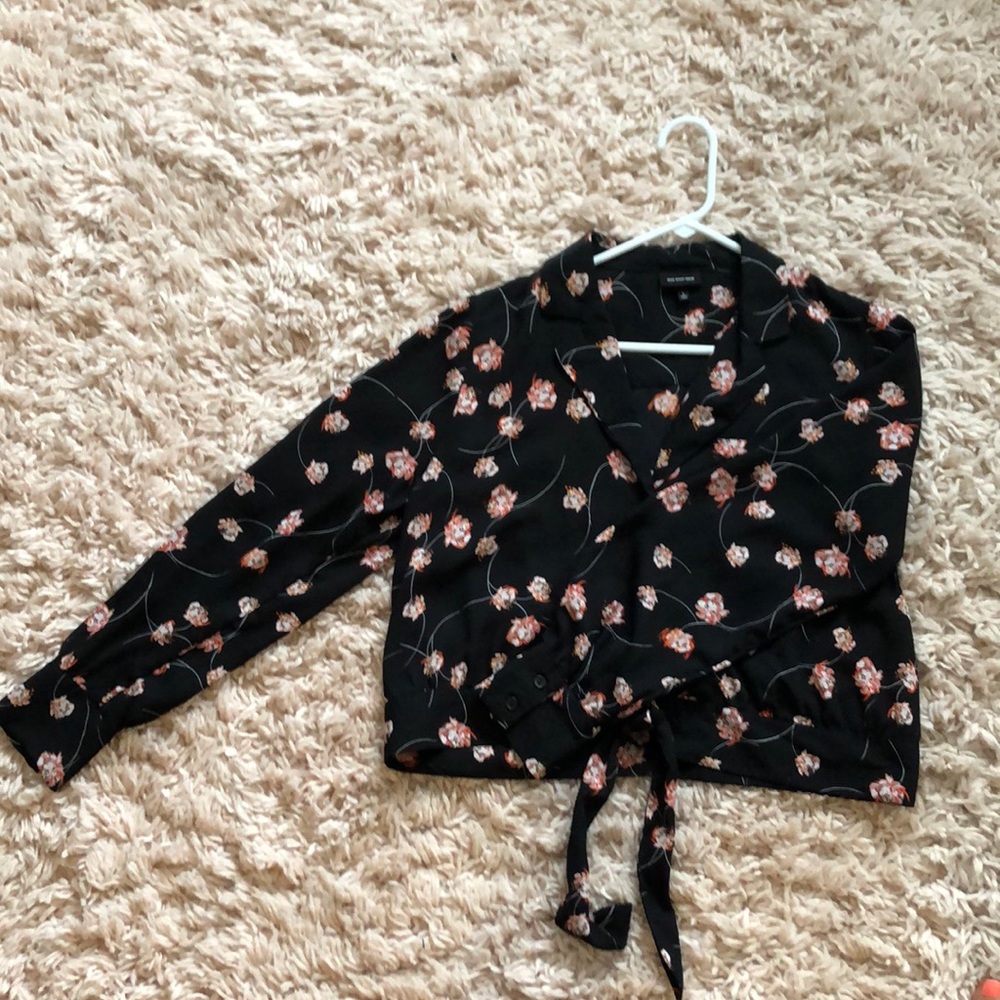 Who wore what button up floral blouse